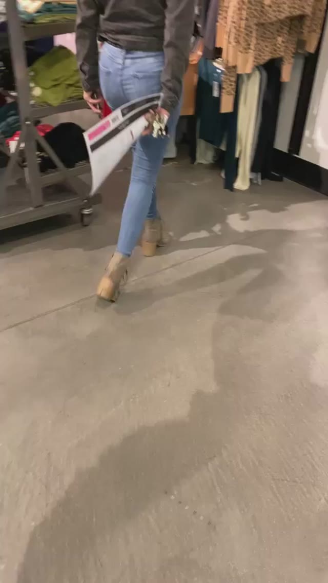 Hot girl wet her jeans in public store