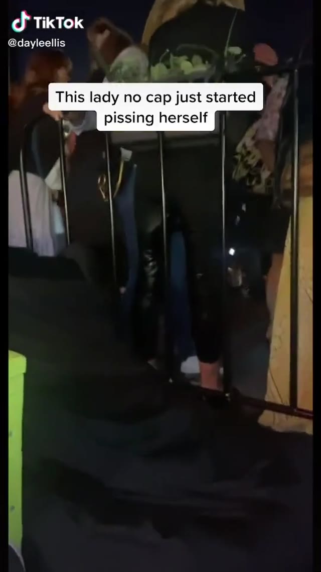 Lady wets herself in line