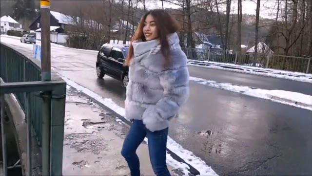 Hot young girl pissing her jeans in the public streets