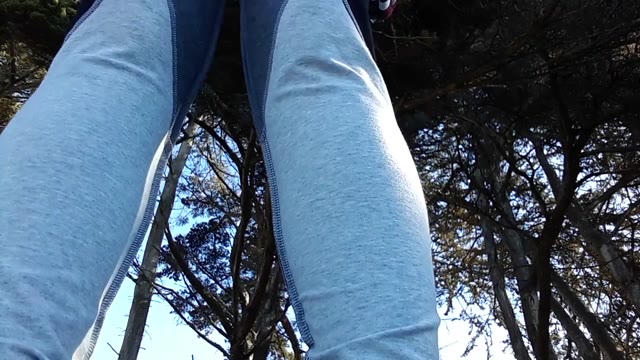 Girl wetting her pants outside