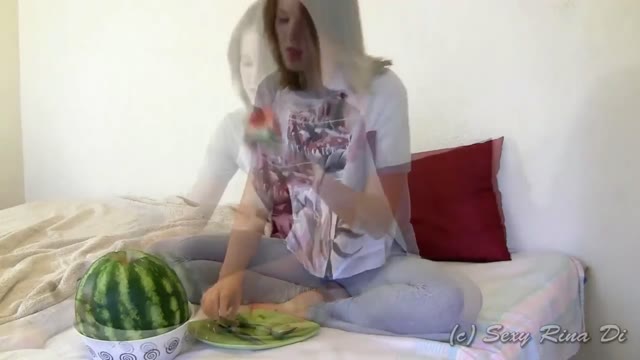 Wetting her leggings while eating watermelon