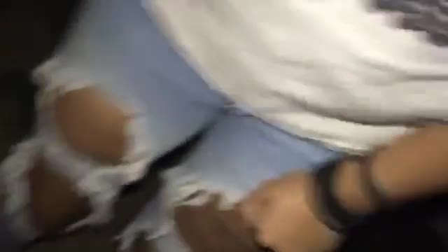 Young girl desperation wetting her jeans