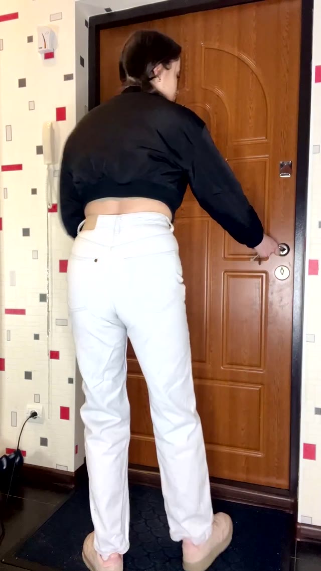 Girl wetting jeans
