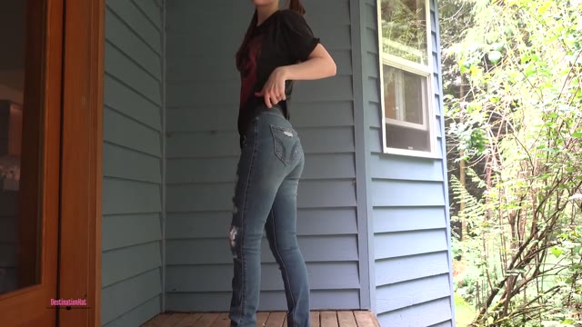 Peeing her jeans