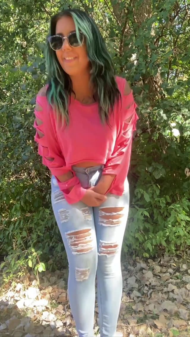 She pees in her jeans outside before finishing up at ho