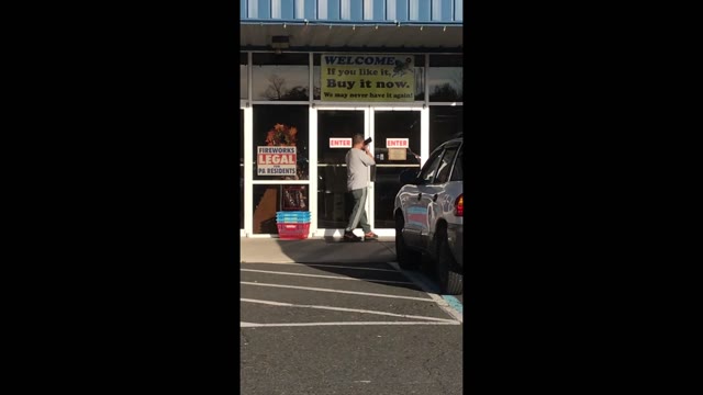 Rewetting jeans in front of the store