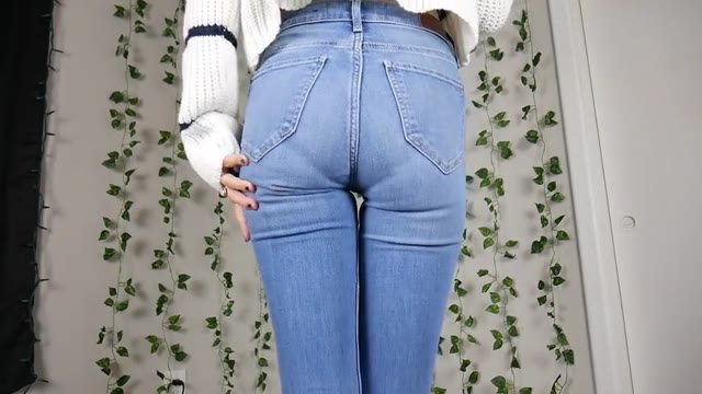Girl wetting her jeans