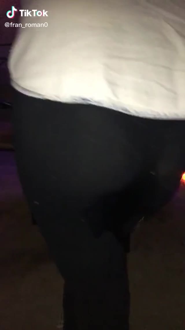 Laughing wetting accident, looks like at a club