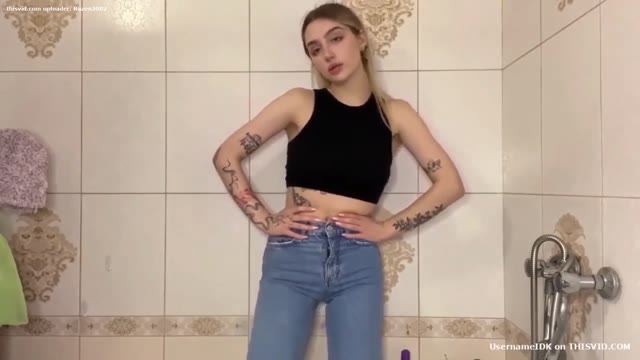 Hot girl wet her jeans in bath