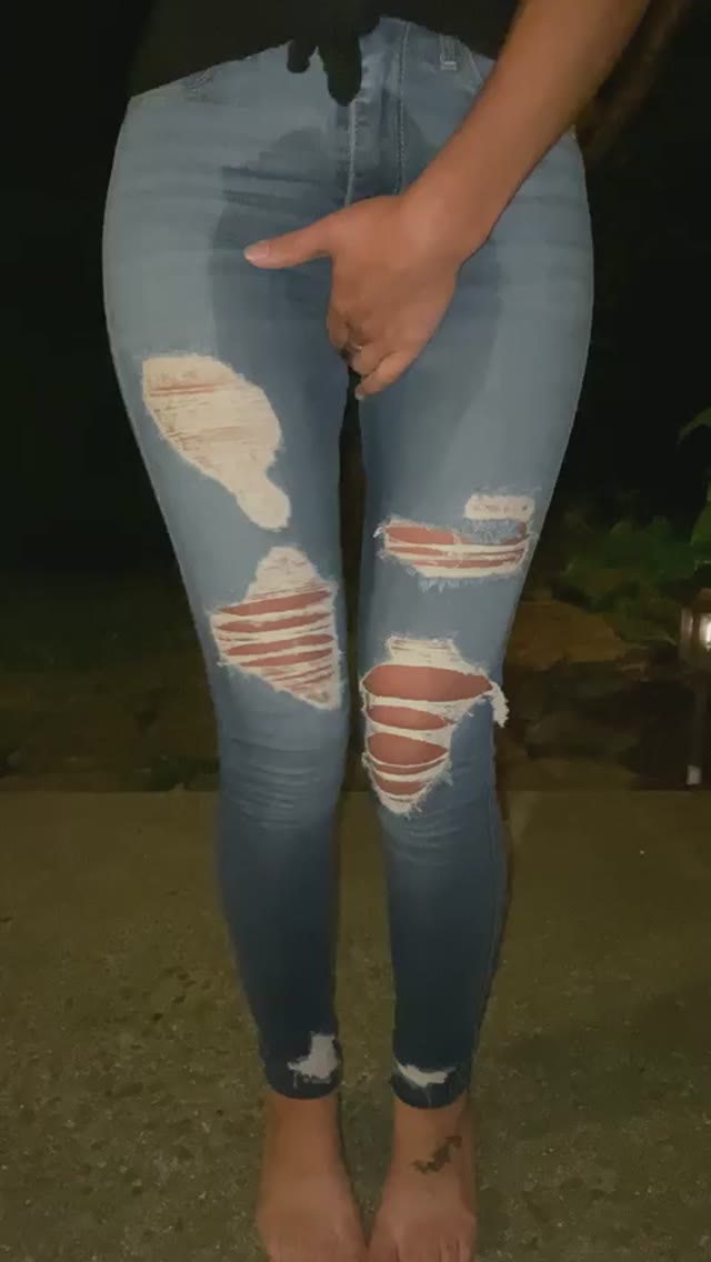 Girl Rewetting jean while smoking