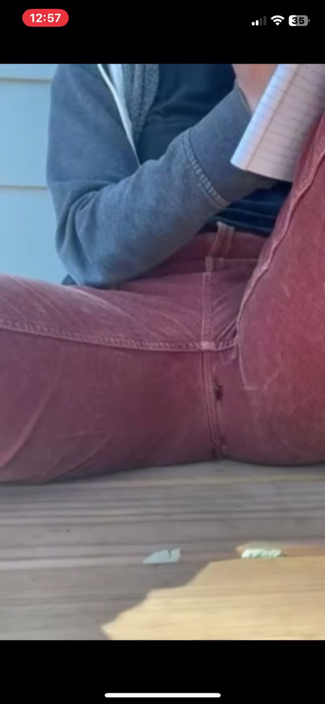 Casually wetting red pants