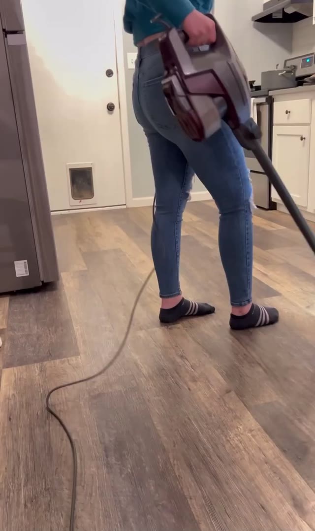Girl peeing while cleaning