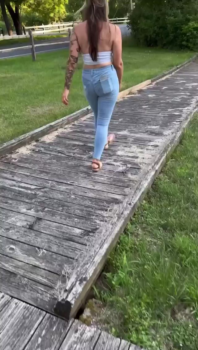 Tatoo girl locked outside peeing her jeans