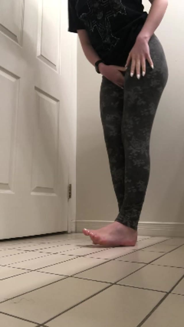 Girl wetting herself