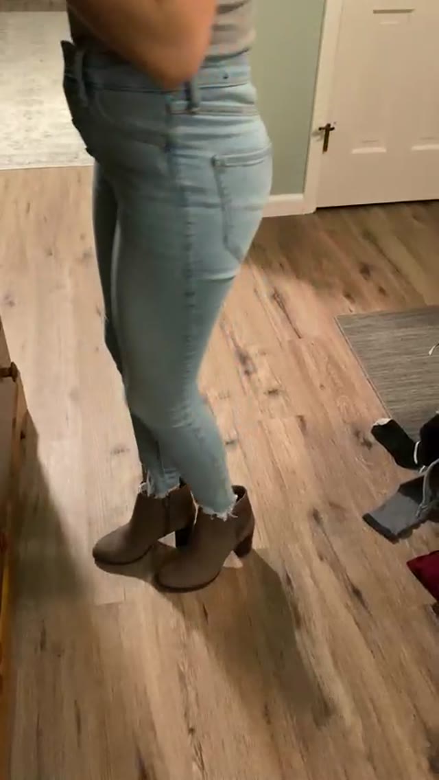 Jeans wetting in front of toilet