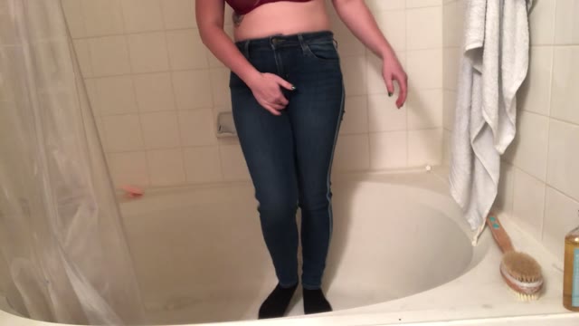 Shirtless wetting in bathtub