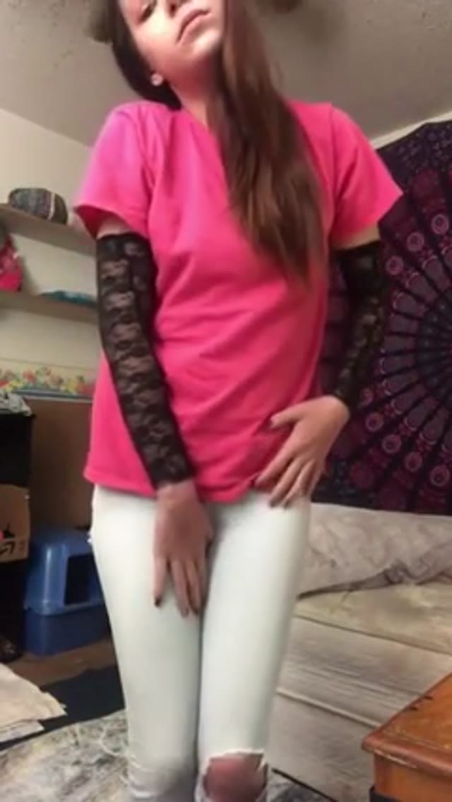 Girl wetting her jeans desperate