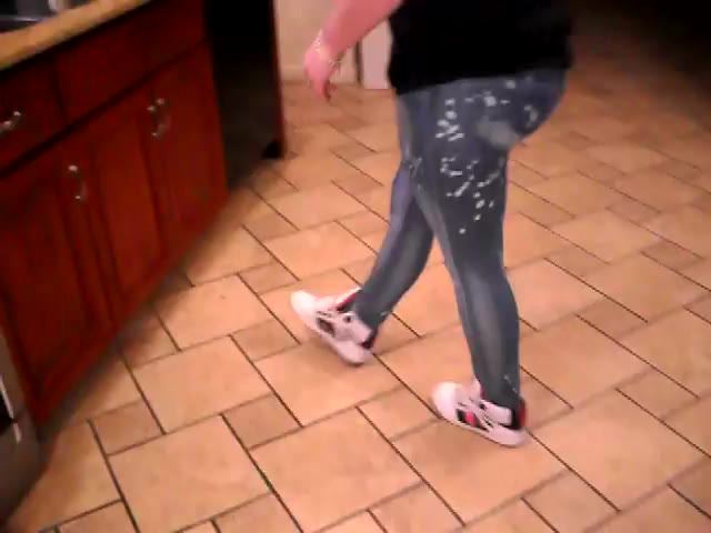 Girl pees herself while cleaning