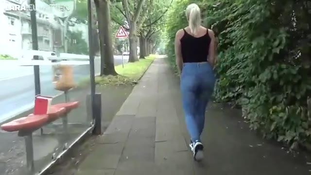 Hot jeans wetting in front of cars