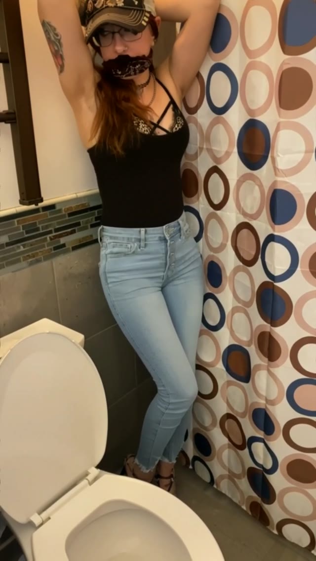 Tied up peeing jeans